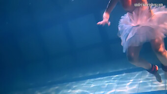 Bulava Lozhkova'S Underwater Photoshoot With A Red Tie And Skirt