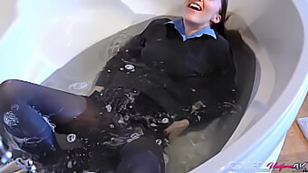 Sophia Smith, A Hot Brunette, Tries Out Her New College Uniform With A Bath.